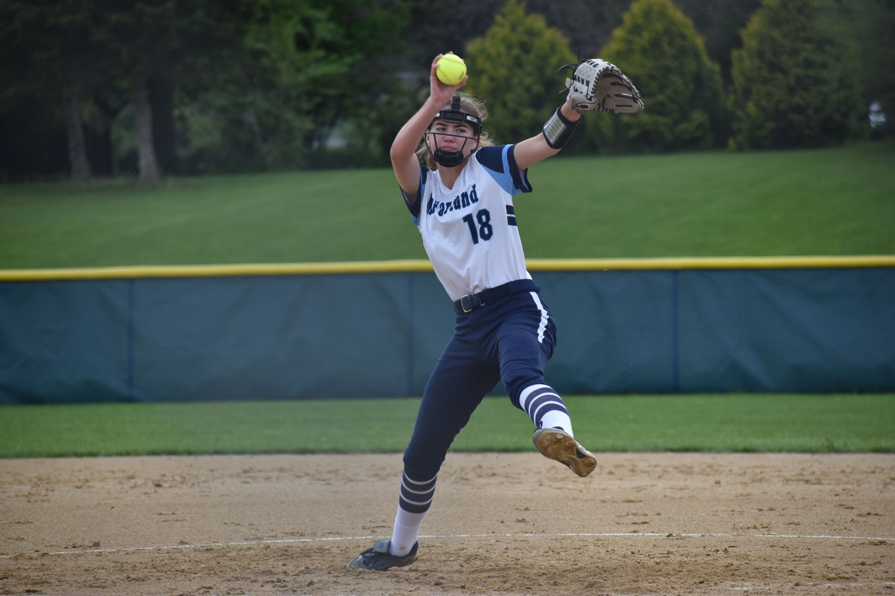 Sophomore Brynne Bieri pitching